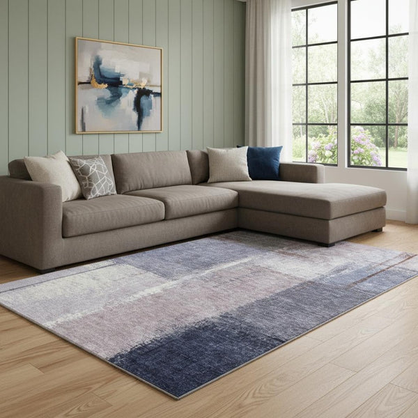 HomeRoots 9' X 12' Abstract Lavender Gray and Ivory Washable Area Rug with UV Protection for High-Traffic Spaces 710633