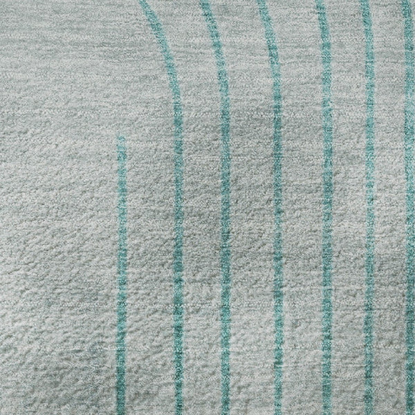 HomeRoots 5' X 8' Teal and Beige Geometric Area Rug - Washable, UV-Protected, Perfect for High-Traffic Spaces 710660