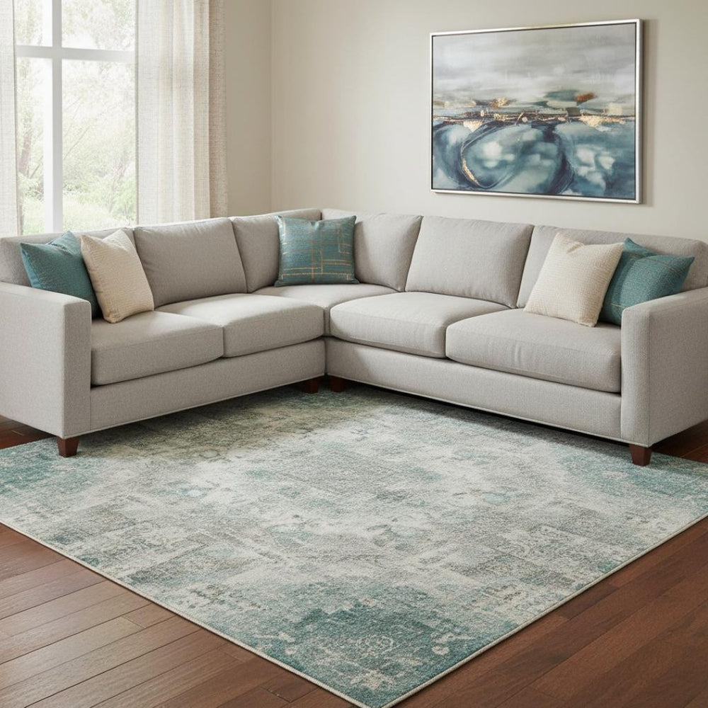 HomeRoots 9' X 12' Teal and Beige Geometric Area Rug - Washable, UV-Protected, Durable for High-Traffic Spaces 710663