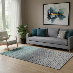 HomeRoots 8' Teal Charcoal and Gray Abstract Washable Round Rug - Durable, UV-Protected for Modern Homes 710828