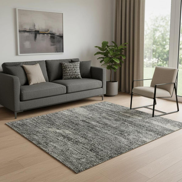HomeRoots 8' Gold Charcoal & Gray Abstract Round Rug - Washable, UV-Protected, Stylish & Durable for Any Space 710846