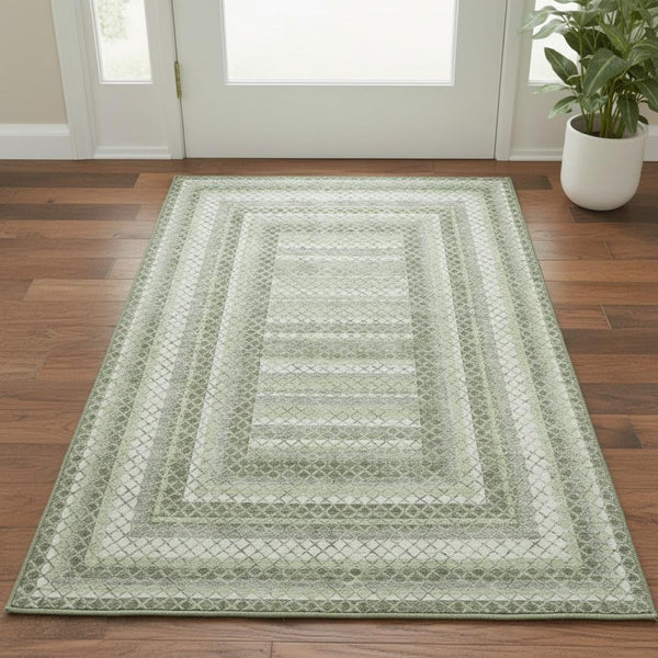 HomeRoots 5' X 8' Artichoke Green Gray Ivory Geometric Area Rug - Washable, UV Protected, Non-Slip Backing! 710863