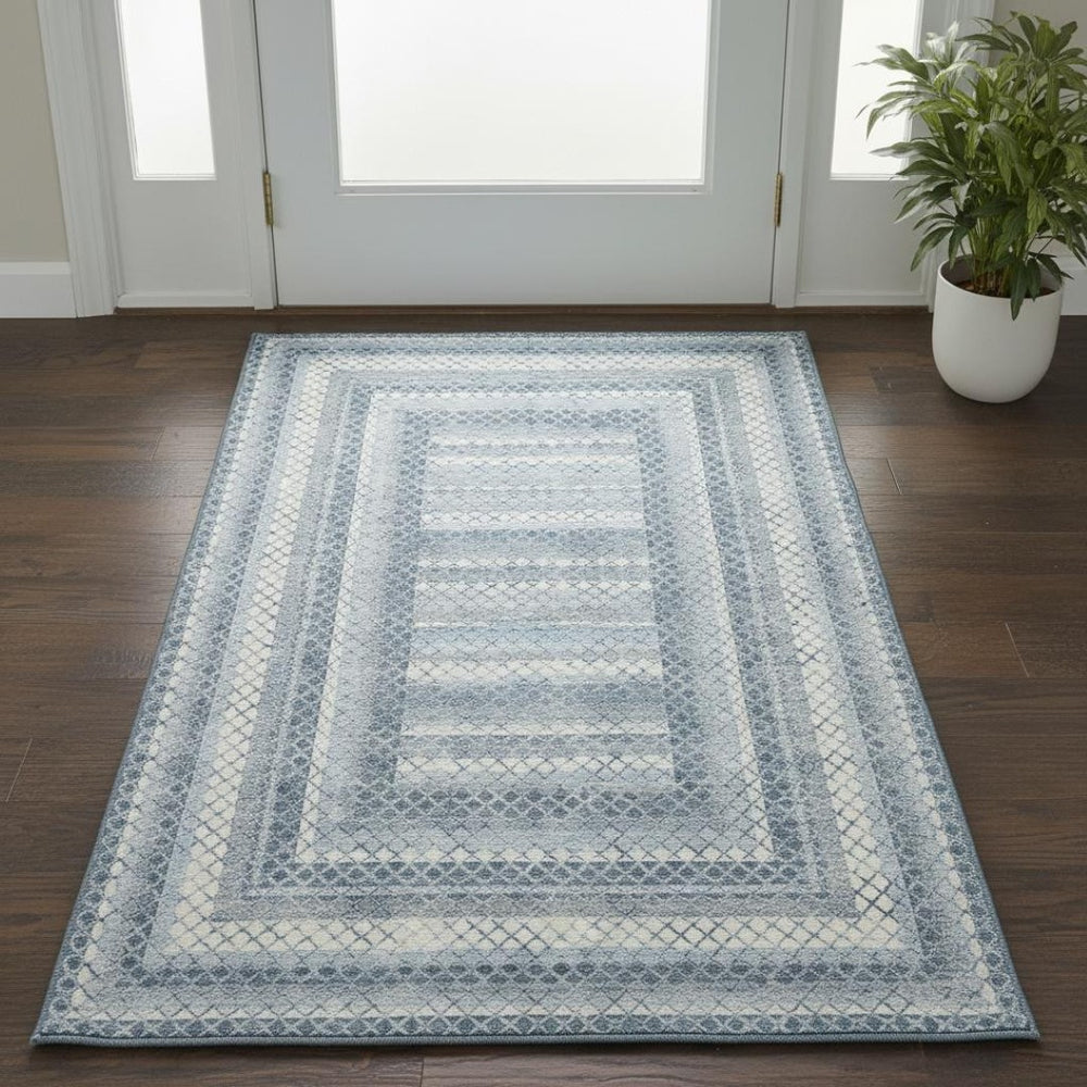 HomeRoots 5' x 8' Denim Blue & Ivory Geometric Area Rug – Stylish, Washable, UV-Protected for Home & Outdoors 710875