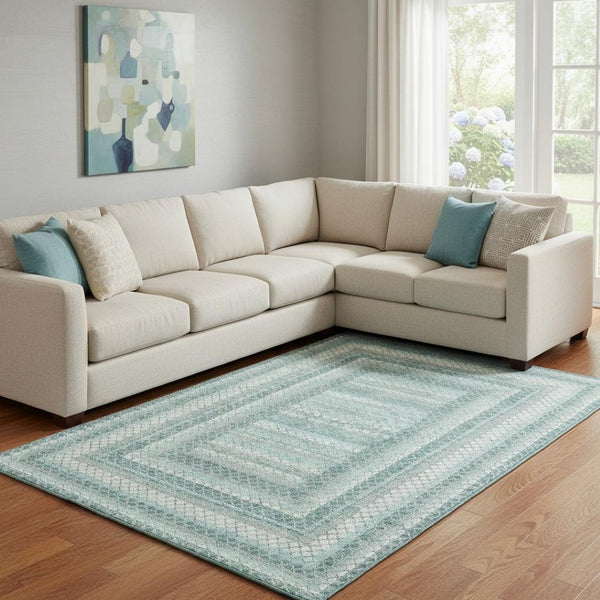 HomeRoots 9' X 12' Teal Ivory and Gray Geometric Washable Area Rug with UV Protection for Stylish Spaces 710890
