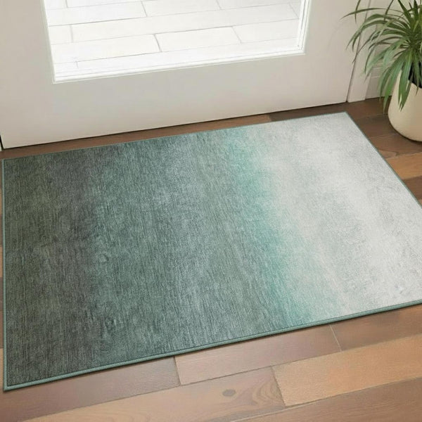 HomeRoots 5' X 8' Pale Aqua Gray Ivory Ombre Area Rug - Washable, UV Protected, Stain Resistant, Non-Slip Design 710947
