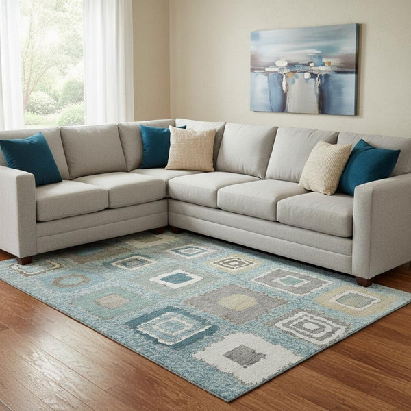 HomeRoots 9' X 12' Vibrant Teal, Ivory & Beige Geometric Washable Area Rug with UV Protection for Durability 711022