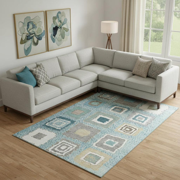 HomeRoots 10' X 14' Teal Ivory Beige Geometric Area Rug - Washable, UV Protected, Perfect for Active Homes! 711023