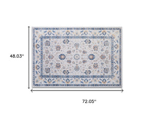 HomeRoots 8' X 10' Geometric Distressed Area Rug in Off-White & Light Blue - Stylish, Durable & Easy Care! 711163