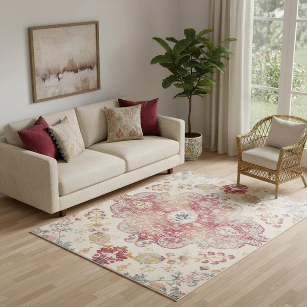 HomeRoots 6' Distressed Ivory Pink and Blue Medallion Area Rug - Washable, Stylish, and Ideal for High-Traffic Spaces 6' X 9' 711970