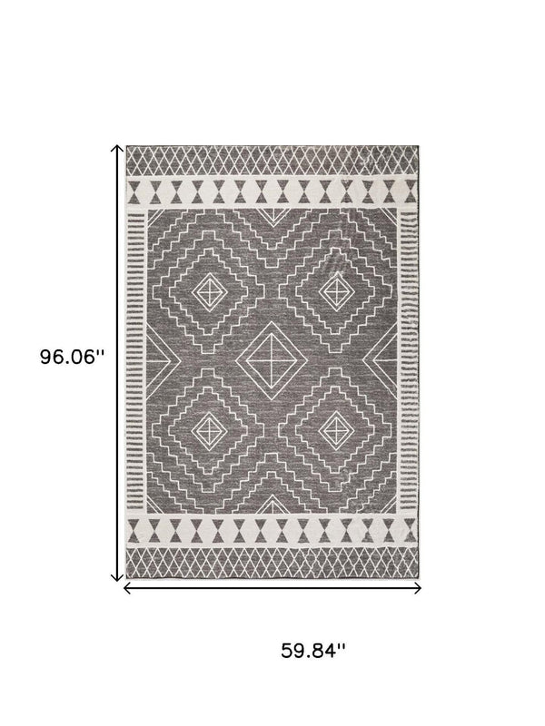 HomeRoots 8' Gray and White Geometric Distressed Area Rug - Stylish, Washable, Stain-Resistant for High Traffic Spaces 8' X 10' 712063