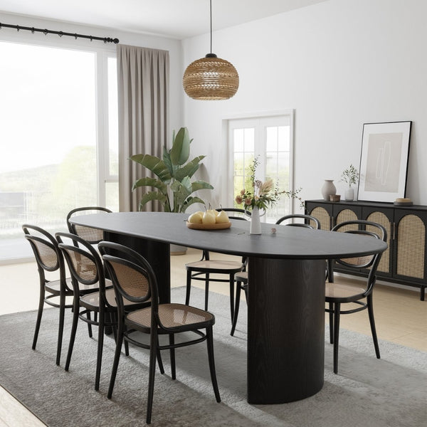 HomeRoots 79" Black Solid Wood Oval Dining Table with Mirrored Double Pedestal Base - Elegant & Versatile Centerpiece 712131