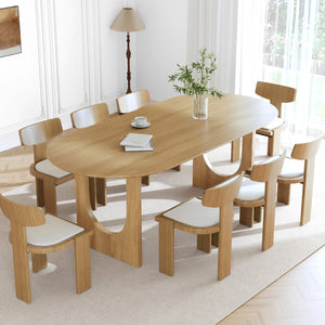 HomeRoots 79" Black Solid Wood Oval Dining Table with Mirrored Pedestal Base - Modern Elegance for Any Space 712144