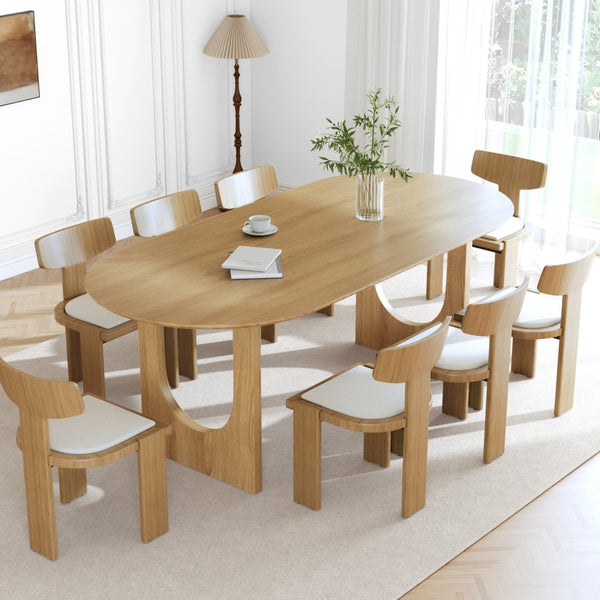 HomeRoots 79" Black Solid Wood Oval Dining Table with Mirrored Pedestal Base - Modern Elegance for Any Space 712144