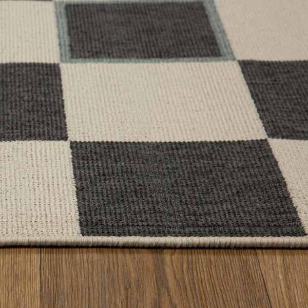 HomeRoots 5' Black and Ivory Checkered Area Rug - Durable, Versatile Design for Modern and Bohemian Interiors 712729