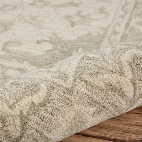 HomeRoots 8' X 10' Hand-Woven Jute Area Rug with Tan and Blue Geometric Design for Bohemian Style Spaces 712736