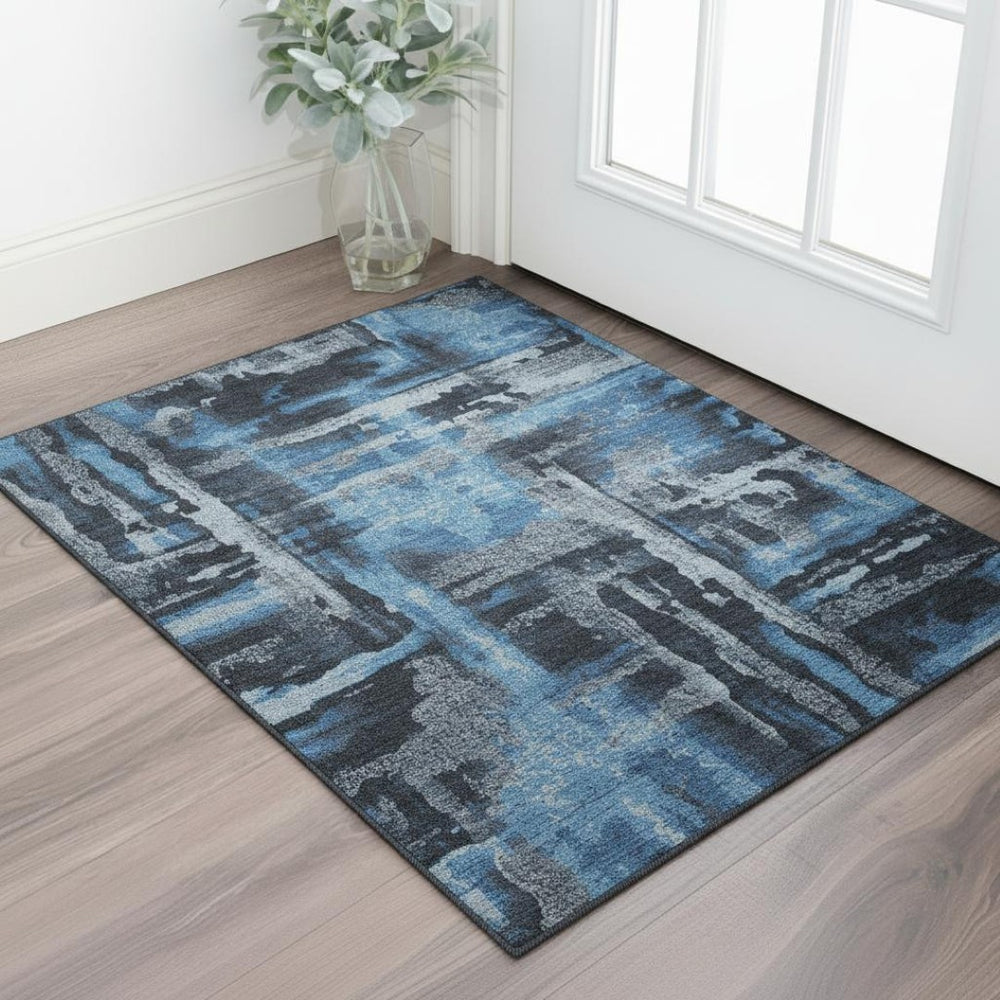 HomeRoots 5' X 8' Black and Blue Abstract Area Rug - Washable, Stain-Resistant, and UV Protected for Homes 714615