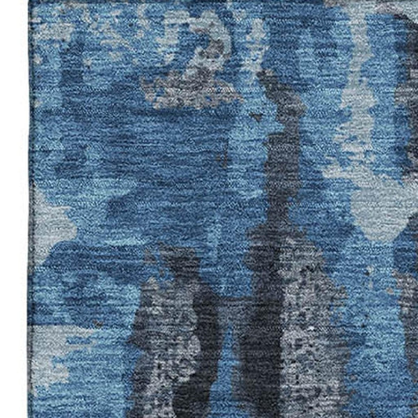 HomeRoots 9' X 12' Stylish Black and Blue Abstract Washable Area Rug with UV Protection for High-Traffic Spaces 714618