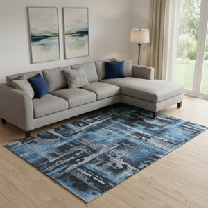 HomeRoots 9' X 12' Stylish Black and Blue Abstract Washable Area Rug with UV Protection for High-Traffic Spaces 714618