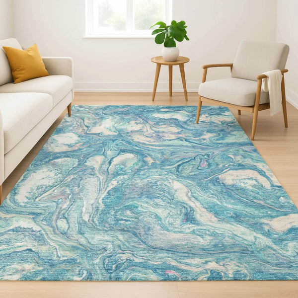 HomeRoots 8' Teal and Ivory Abstract Washable Round Rug with UV Protection for Modern Homes and Easy Care 714730