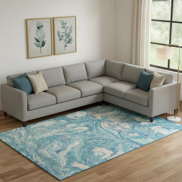HomeRoots 10' X 14' Teal and Ivory Abstract Area Rug - Machine Washable, UV Protected, Perfect for High Traffic Spaces 714733
