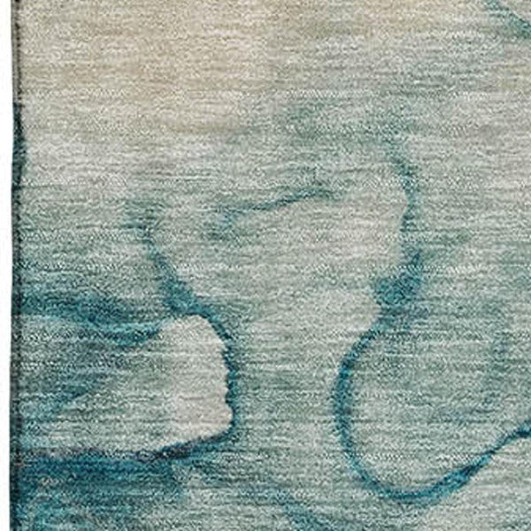 HomeRoots 5' X 8' Brown and Teal Abstract Area Rug - Stylish, Washable, Stain Resistant with UV Protection! 714747
