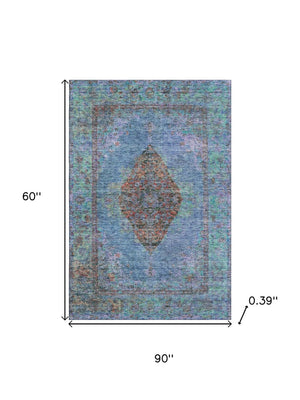 HomeRoots 8' Blue and Rust Medallion Round Rug - Washable, UV-Protected, Durable Accent for Any Space! 714820
