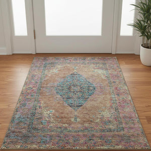 HomeRoots 5' Orange and Pink Medallion Area Rug - Washable, Stain Resistant, UV Protected for Busy Homes 714849