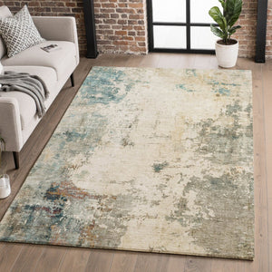 HomeRoots 9' X 12' Ivory and Teal Abstract Area Rug – Washable, UV Protected, Durable for Family Spaces 714870