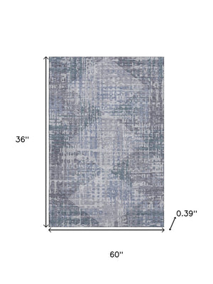 HomeRoots 5' X 8' Blue And Purple Geometric Area Rug - Washable, UV-Protected, Durable for Homes with Kids & Pets 714999