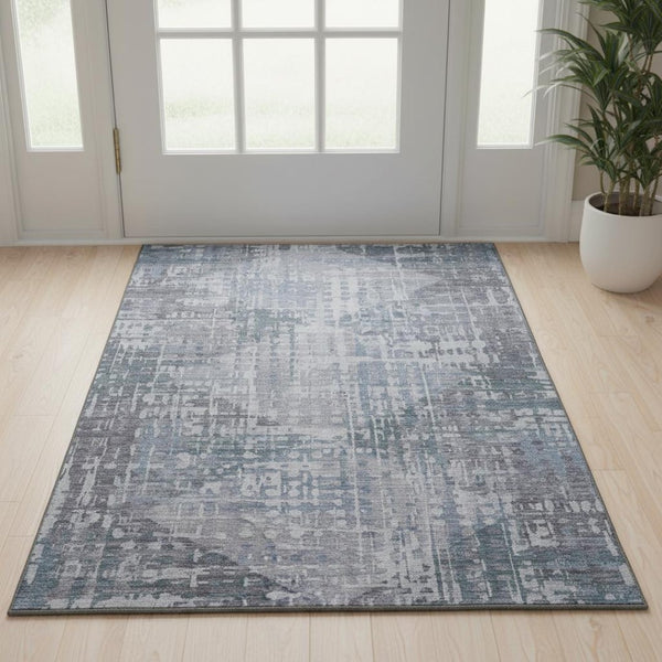 HomeRoots 5' X 8' Blue And Purple Geometric Area Rug - Washable, UV-Protected, Durable for Homes with Kids & Pets 714999