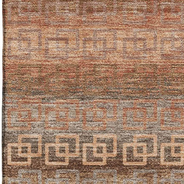 HomeRoots 8' Copper and Rust Striped Washable Round Rug - Durable, UV-Protected, Perfect for Any Space! 715084