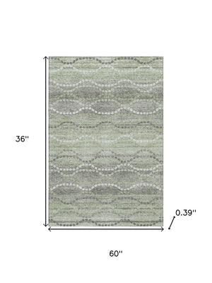 HomeRoots 5' X 8' Green And Ivory Abstract Geometric Rug - Washable, UV-Protected, Pet-Friendly Design! 715275