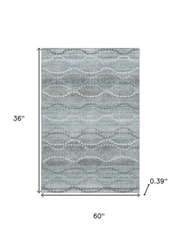 HomeRoots 5' X 8' Teal And Ivory Abstract Geometric Area Rug - Washable, UV Protected, Pet Friendly Design! 715299