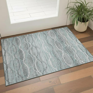 HomeRoots 5' X 8' Teal And Ivory Abstract Geometric Area Rug - Washable, UV Protected, Pet Friendly Design! 715299