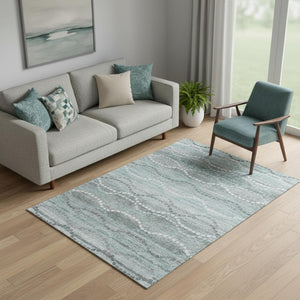 HomeRoots 8' Teal and Ivory Abstract Geometric Round Rug - Washable, UV-Protected, Stain-Resistant, Durable Design 715300