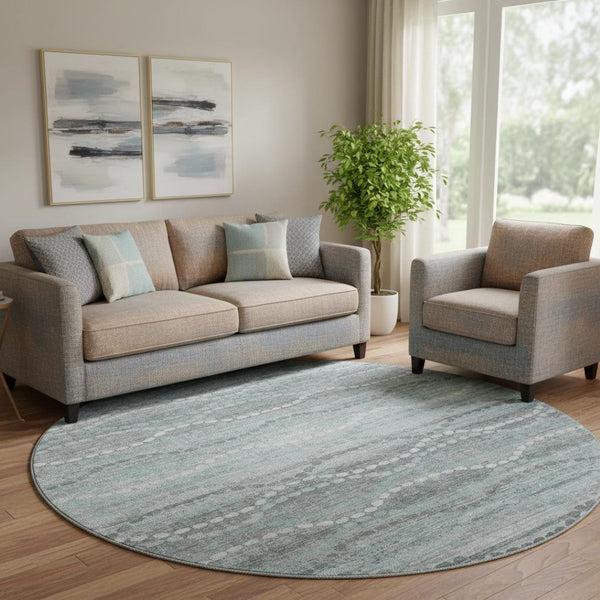 HomeRoots 8' X 10' Stylish Teal & Ivory Abstract Area Rug - Washable, UV Protected, Non-Slip, Family Friendly! 715301