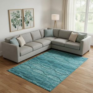 HomeRoots 10' X 14' Turquoise & Aqua Abstract Geometric Washable Area Rug - Durable, UV Protected & Stylish! 715339