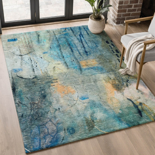 HomeRoots 9' X 12' Teal and Green Abstract Area Rug - Washable, Stain Resistant, UV Protected for Modern Spaces 715362