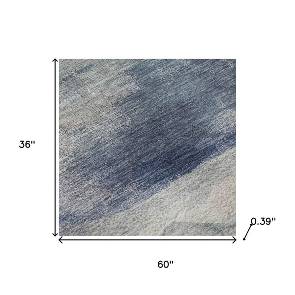 HomeRoots 5' X 8' Blue and Ivory Abstract Area Rug - Machine Washable, UV Protected, Stain Resistant, Durable! 715377