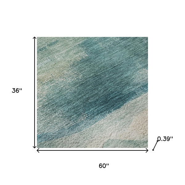 HomeRoots 5' X 8' Teal and Ivory Abstract Area Rug - Durable, Washable, UV-Protected for High-Traffic Spaces! 715389