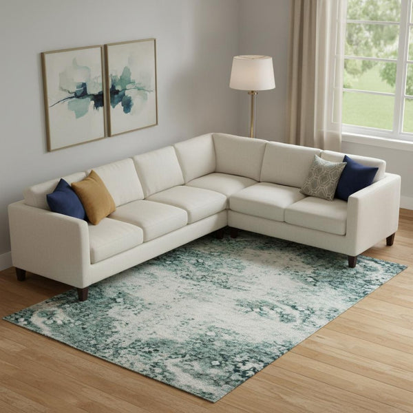 HomeRoots 9' X 12' Teal and Ivory Abstract Area Rug - Stylish, Washable, UV-Protected for High-Traffic Spaces 715392