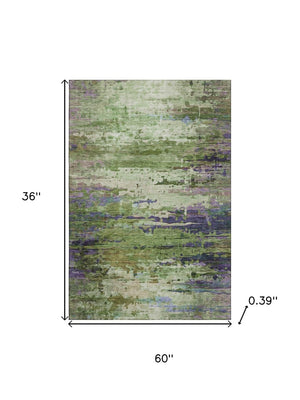 HomeRoots 5' X 8' Vibrant Green and Purple Abstract Area Rug - Washable, UV Protected, Durable & Stylish Design 715443