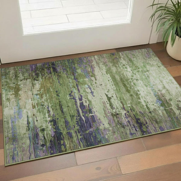 HomeRoots 5' X 8' Vibrant Green and Purple Abstract Area Rug - Washable, UV Protected, Durable & Stylish Design 715443