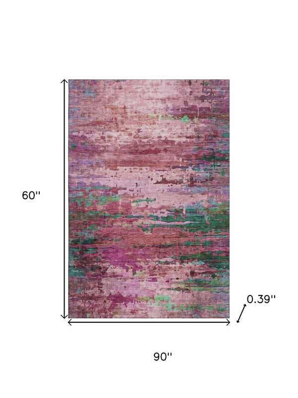 HomeRoots 8' Vibrant Pink and Green Abstract Washable Round Rug with UV Protection for Modern Spaces 715450
