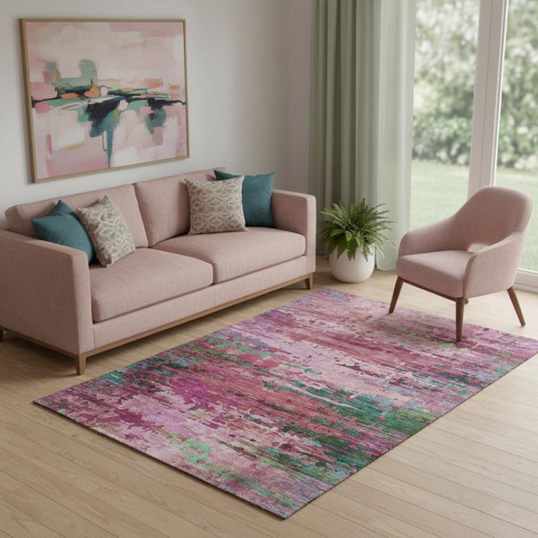 HomeRoots 8' Vibrant Pink and Green Abstract Washable Round Rug with UV Protection for Modern Spaces 715450