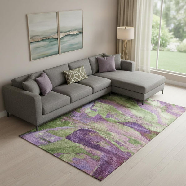 HomeRoots 10' X 14' Abstract Area Rug in Bold Purple & Green - Washable, UV-Protected, Non-Slip Design! 715585