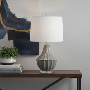 HomeRoots 25" Clear Acrylic Table Lamp with White Drum Shade - Modern Design & Built-in Outlet for Convenience 716171