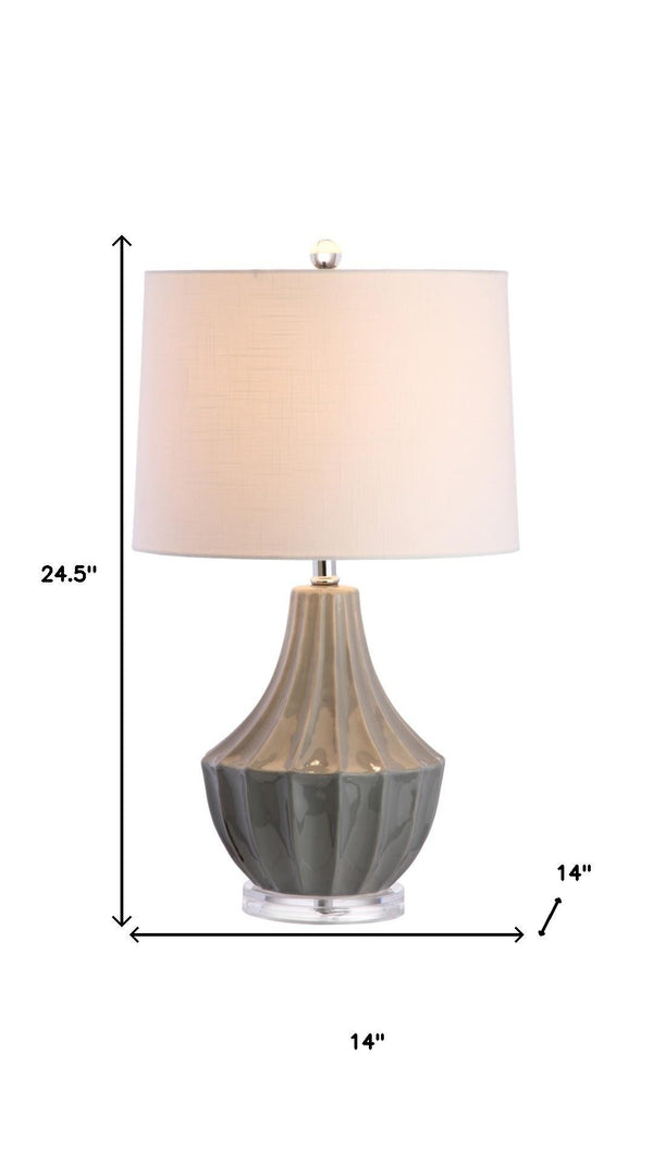 HomeRoots 25" Clear Acrylic Table Lamp with White Drum Shade - Modern Design & Built-in Outlet for Convenience 716171
