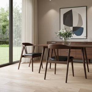 HomeRoots Set of Two Mid-Century Modern Black Faux Leather Side Chairs with Walnut Wood Legs for Stylish Living 716262