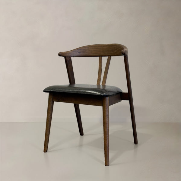 HomeRoots Set of Two Mid-Century Modern Black Faux Leather Side Chairs with Walnut Wood Legs for Stylish Living 716262